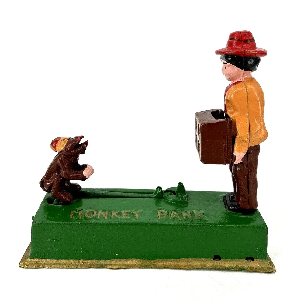 ORGAN GRINDER MONKEY BANK Cast Iron Works Great‎